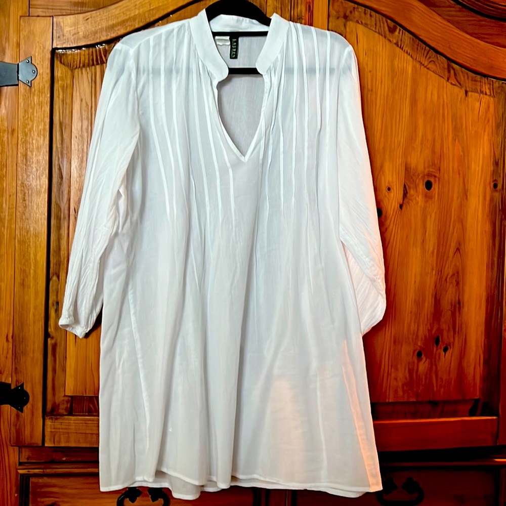 Woman’s white summer dress